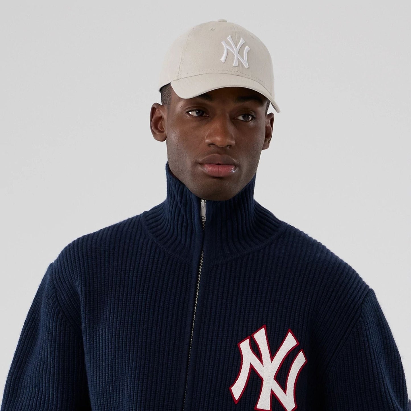 The Male model is wearing New York Yankees MLB Navy Cardigan 7