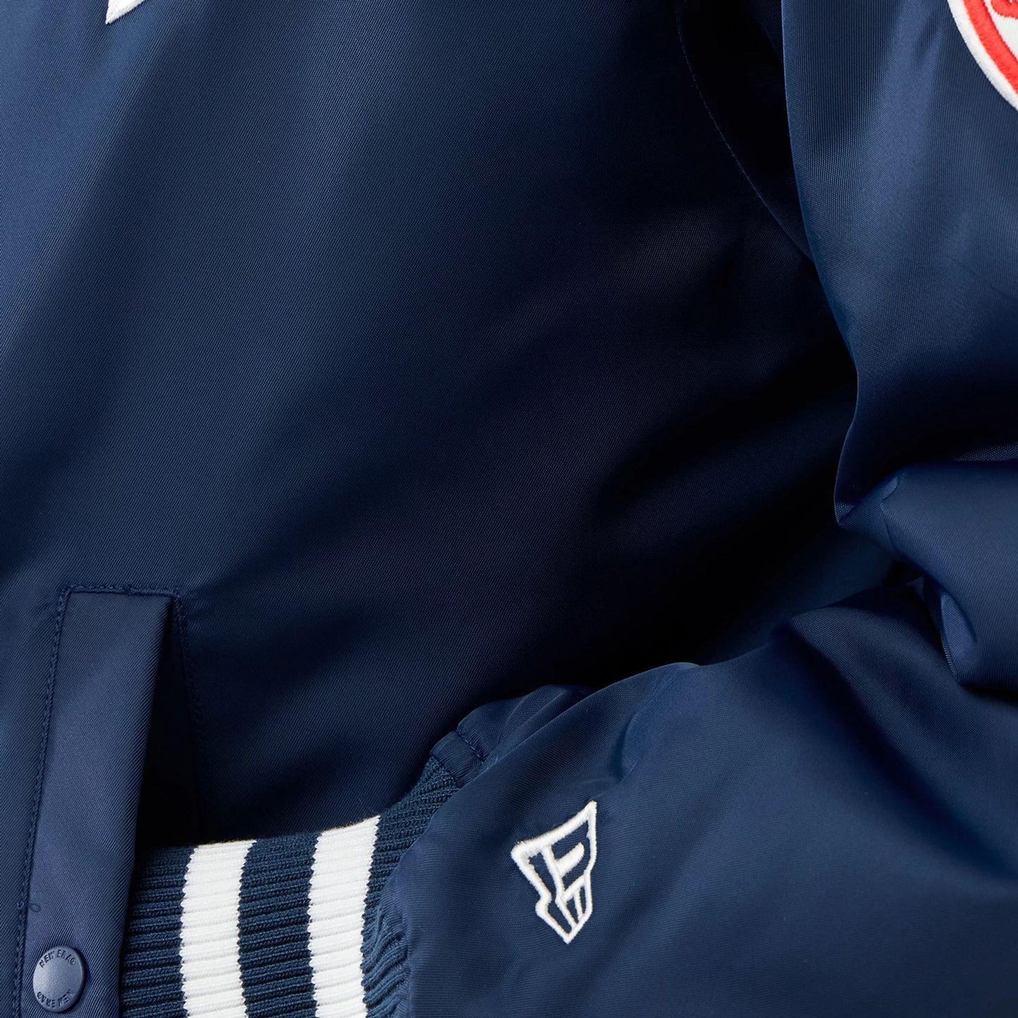 The Male model is wearing New York Yankees MLB Authentic Navy Stadium Jacket 7