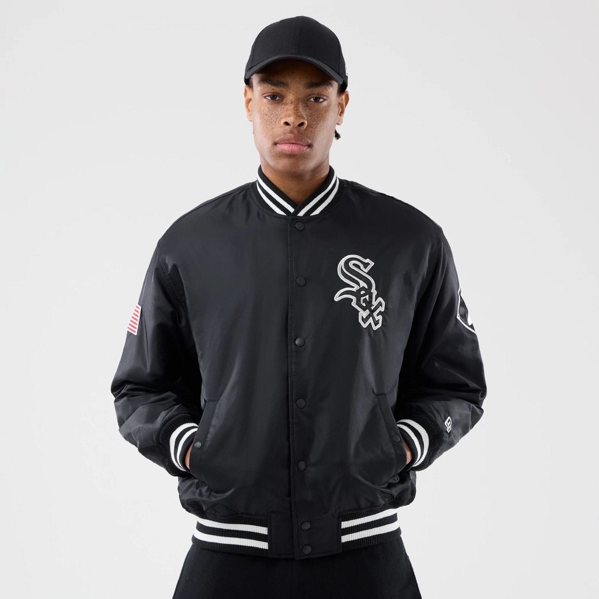 The Male model is wearing Chicago White Sox MLB Authentic Black Stadium Jacket 1