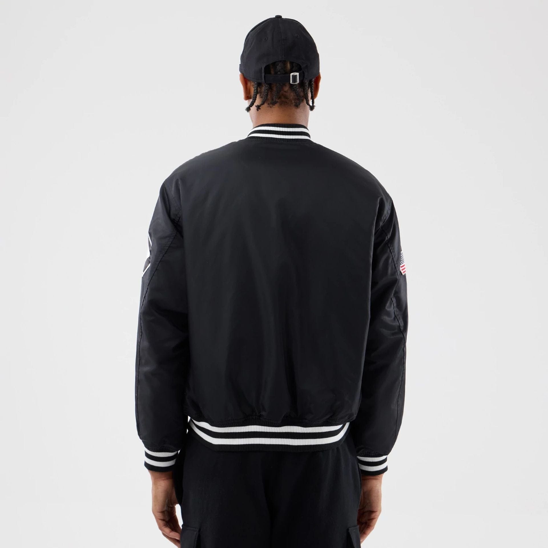 The Male model is wearing Chicago White Sox MLB Authentic Black Stadium Jacket 2