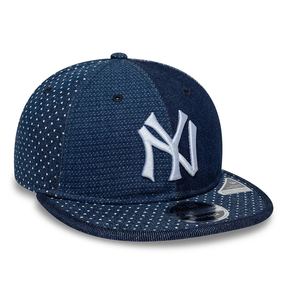 New York Yankees MLB Multi Denim Dark Blue Retro Crown New Era 9FIFTY Adjustable Cap, three-quarter view showing the raised white NY logo on the front panel, dark blue dotted denim pattern on the crown and visor, with a 9FIFTY size sticker.