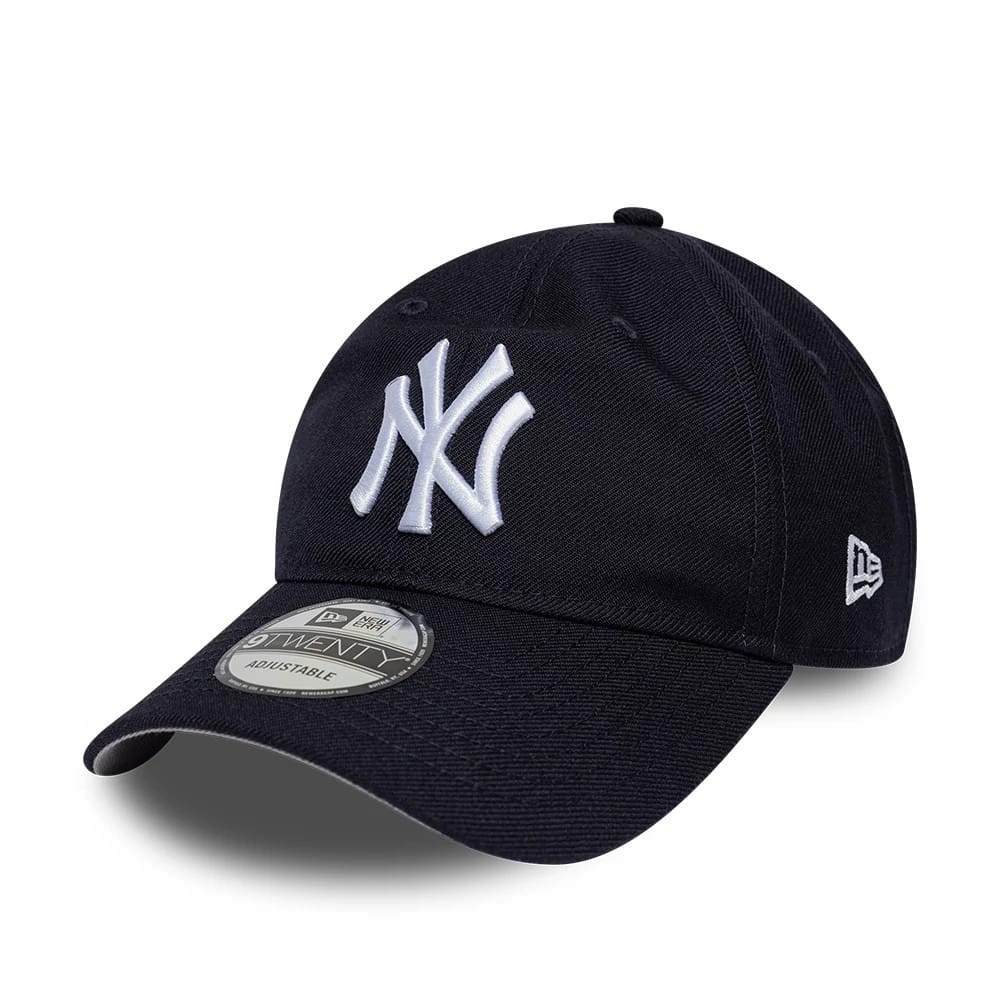 New York Yankees MLB Wool Navy New Era 9TWENTY Adjustable Cap, three-quarter view showing a raised white NY logo on the front panel, a curved visor with a 9TWENTY size sticker, and the New Era flag logo on the left side.