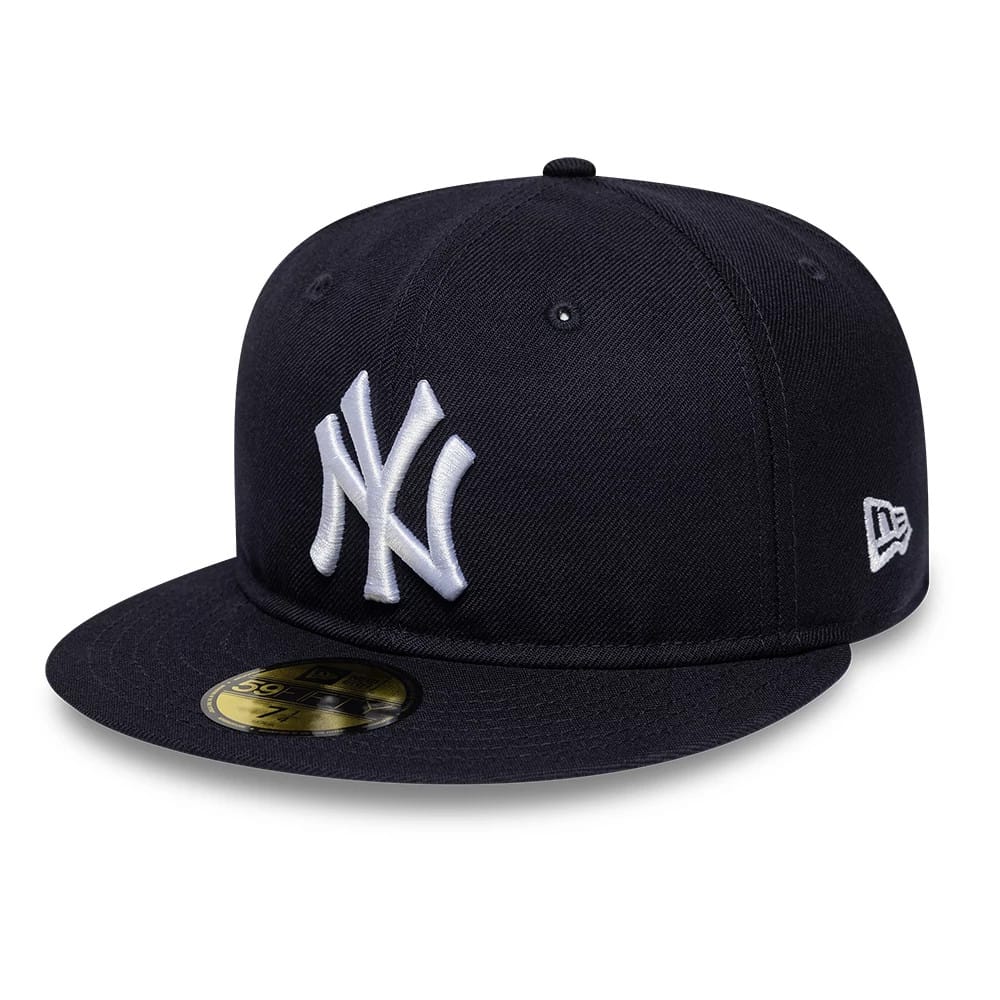New York Yankees MLB Soft Buckram Navy New Era 59FIFTY Fitted Cap, front view with the raised white NY logo embroidered on the front panel, curved visor and the gold 59FIFTY size sticker on top of the navy visor.