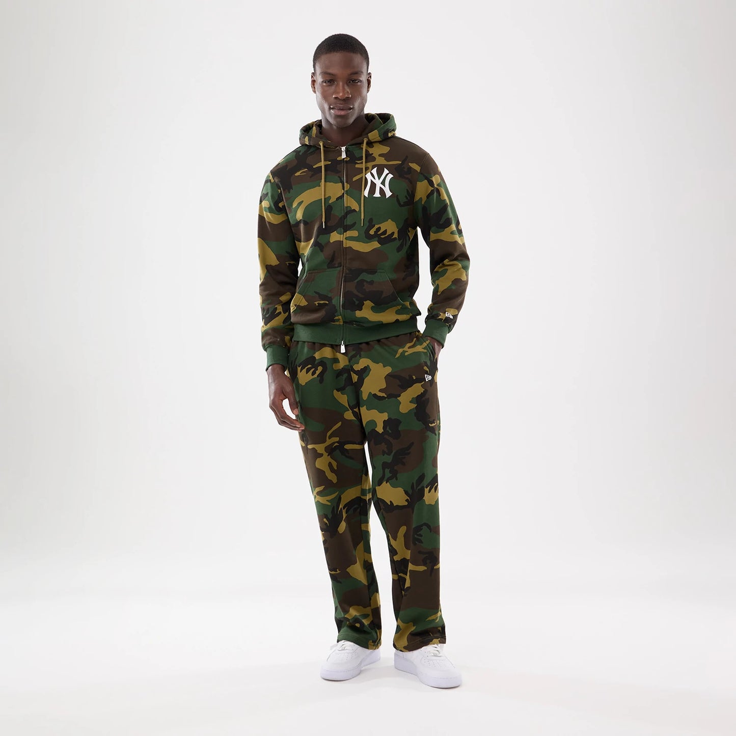The model is wearing this MLB Camo New York Yankees 2 Way Full Zip Hoodie in Woodland Camo. 8