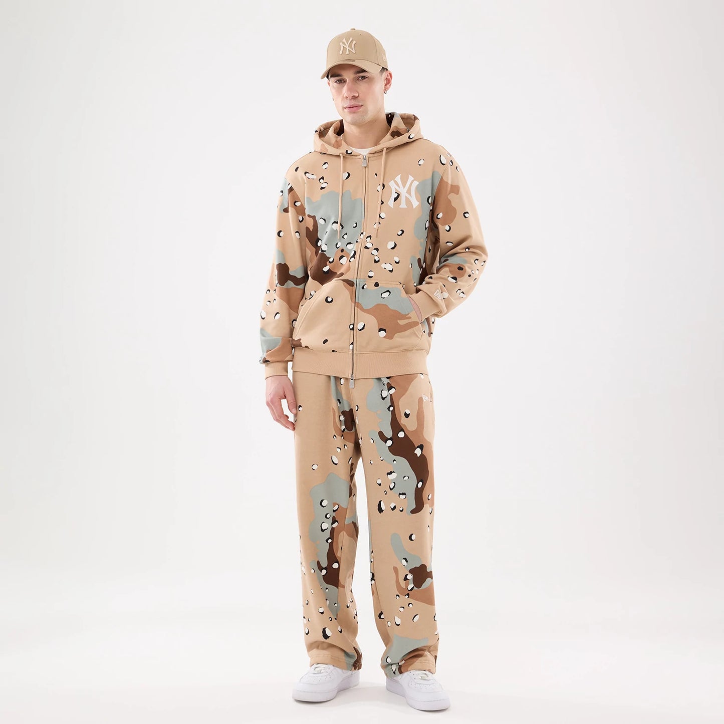 The model is wearing these New Era Desert Camo Joggers. 8