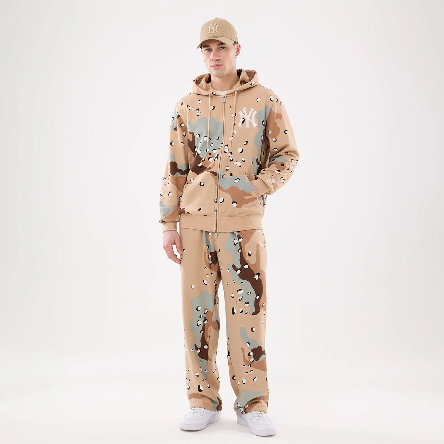 The model is wearing these New Era Desert Camo Joggers. 8