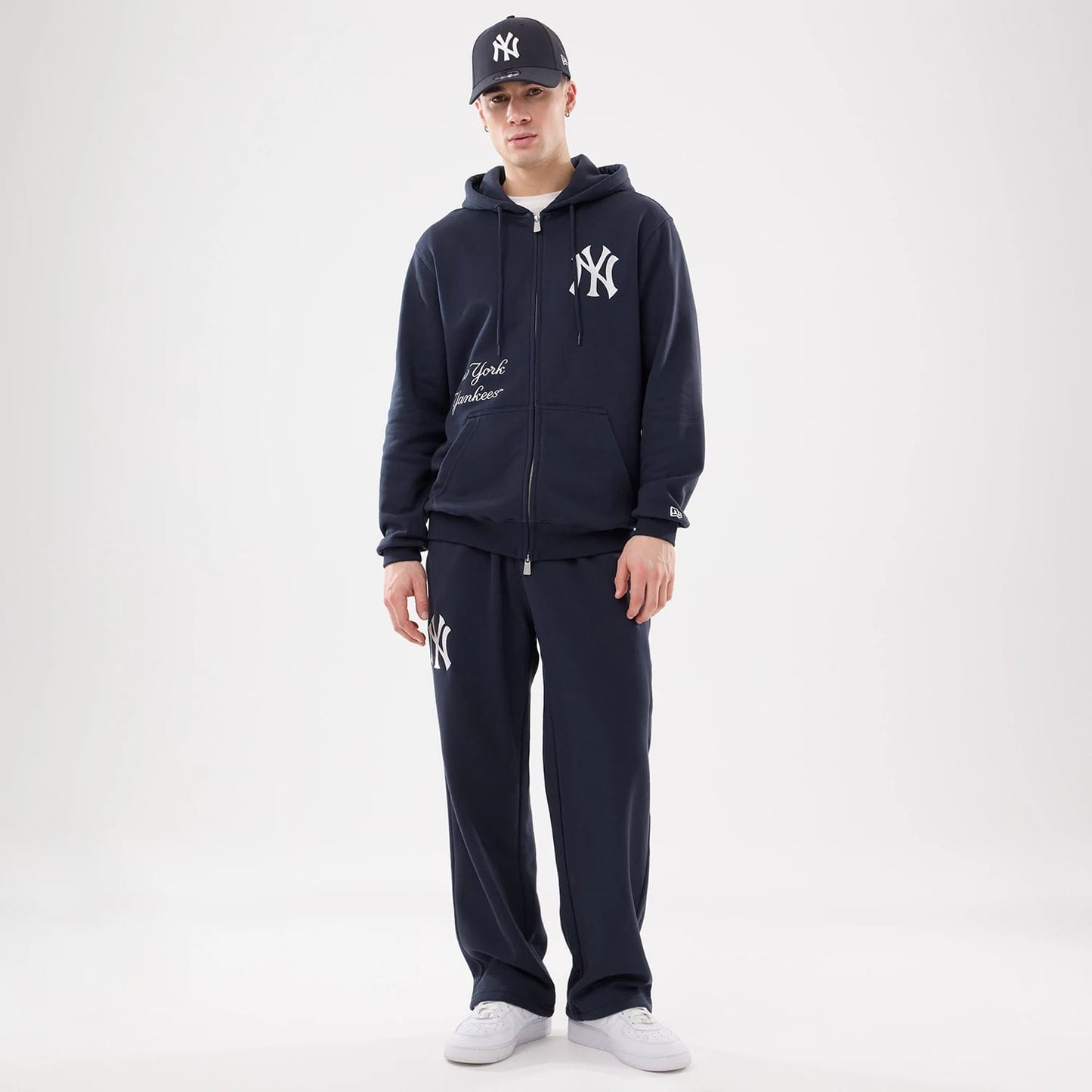 The model is wearing this MLB Comfort New York Yankees Joggers in blue. 8