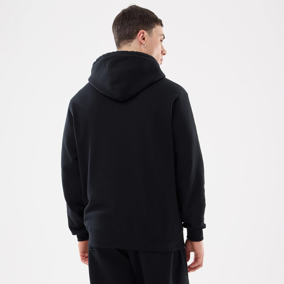 New Era New York Mets MLB Comfort Black 2 Way Full Zip Hoodie, rear view showing the hooded design and plain black back with relaxed fit sleeves not featuring any logos or embellishments.
