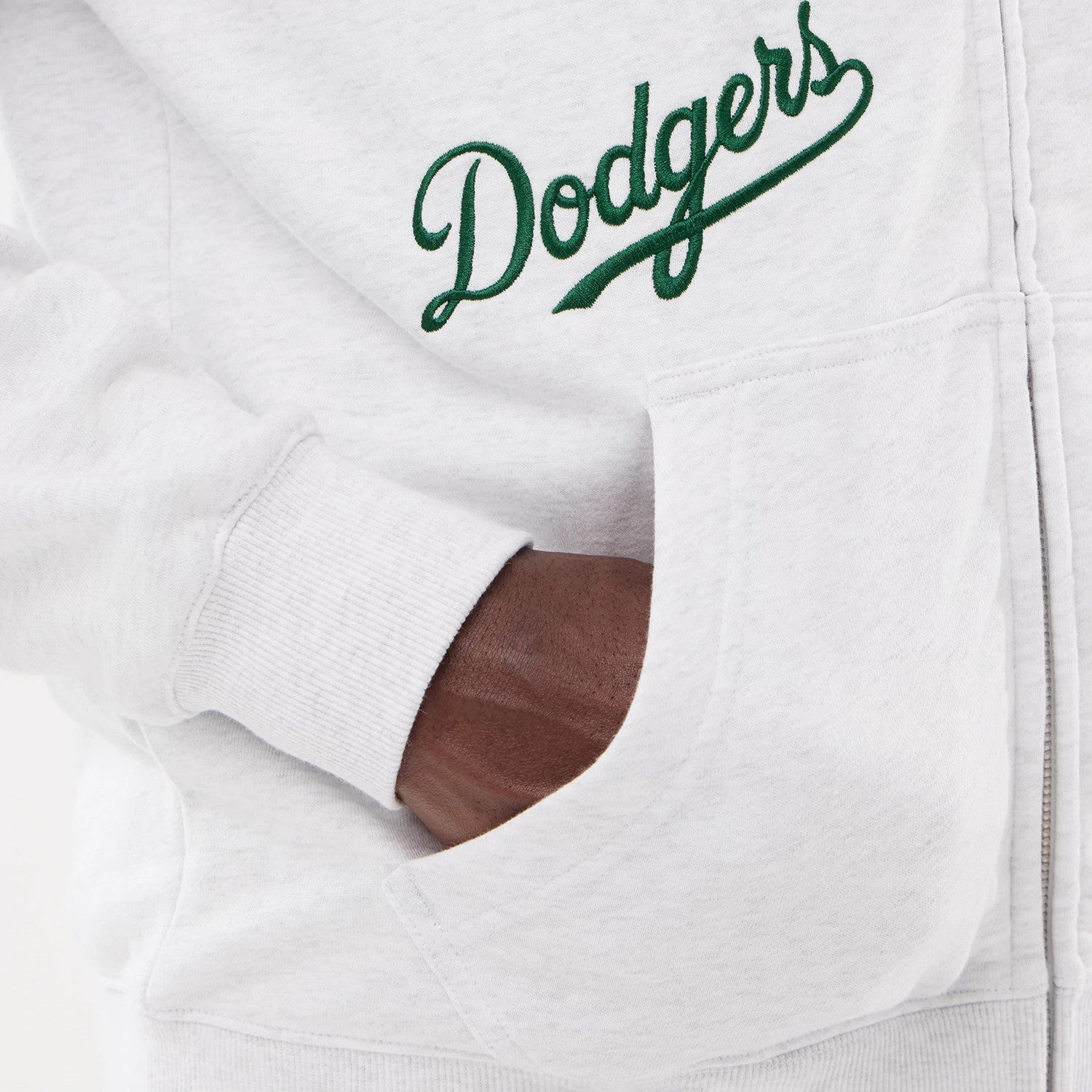 The model is wearing this MLB Comfort LA Dodgers 2 Way Full Zip Hoodie in grey. 4