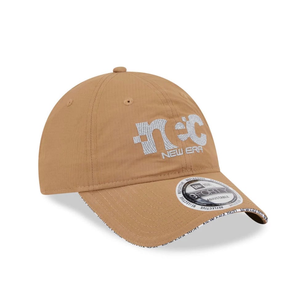 New Era NEC Logo Beige New Era 9FORTY Unstructured Adjustable Cap, three-quarter view showing the white embroidered NEC logo on the front panel, with a curved visor and the 9FORTY size sticker on top.