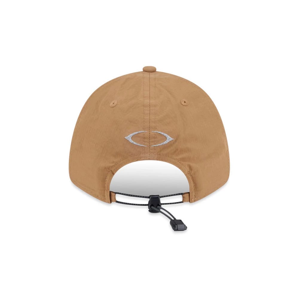 New Era NEC Logo Beige New Era 9FORTY Unstructured Adjustable Cap, rear view showing the silver embroidered NEC logo centred on the back panels, with an adjustable toggle strap at the open back and a matching beige top button.