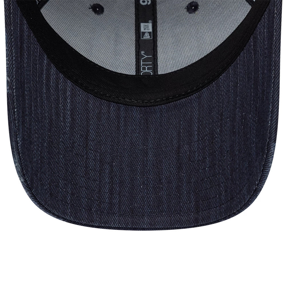 Pictured is this New Era Street Archived 9FORTY cap in navy. 7