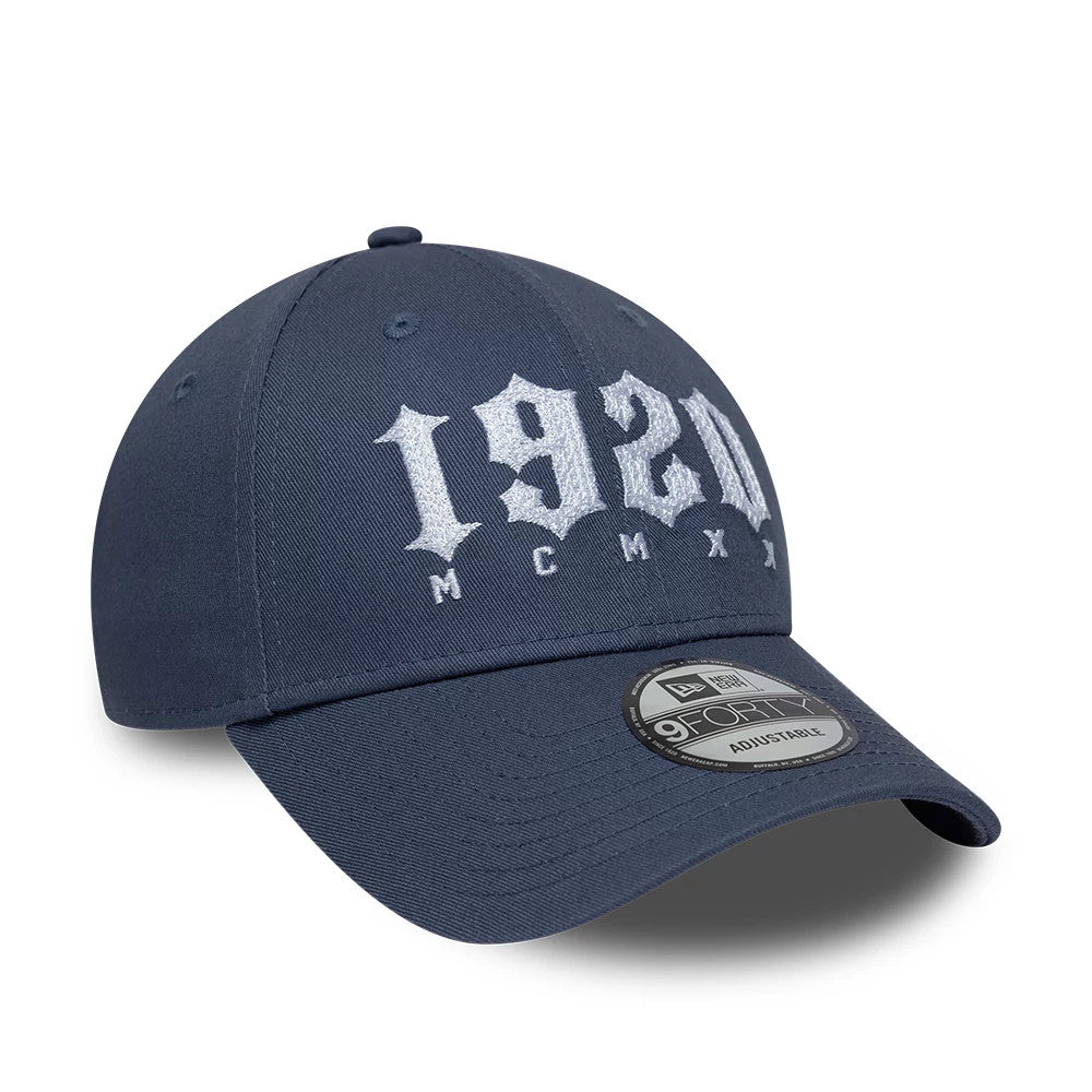 Pictured is this New Era Street Archived 9FORTY cap in dark blue. 4