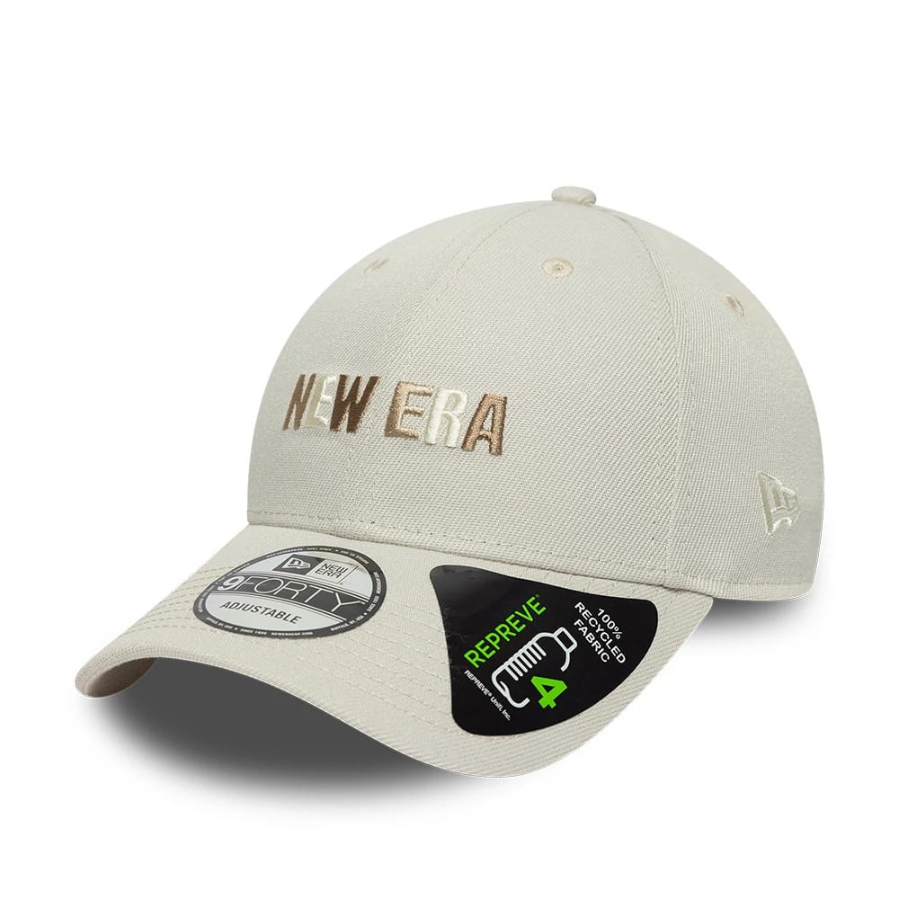 New Era Earth Day Beige 9FORTY Adjustable Cap, front view showing brown and white raised embroidery of the New Era logo on the crown, curved visor with a 9FORTY size sticker, and a New Era flag logo on the left side.