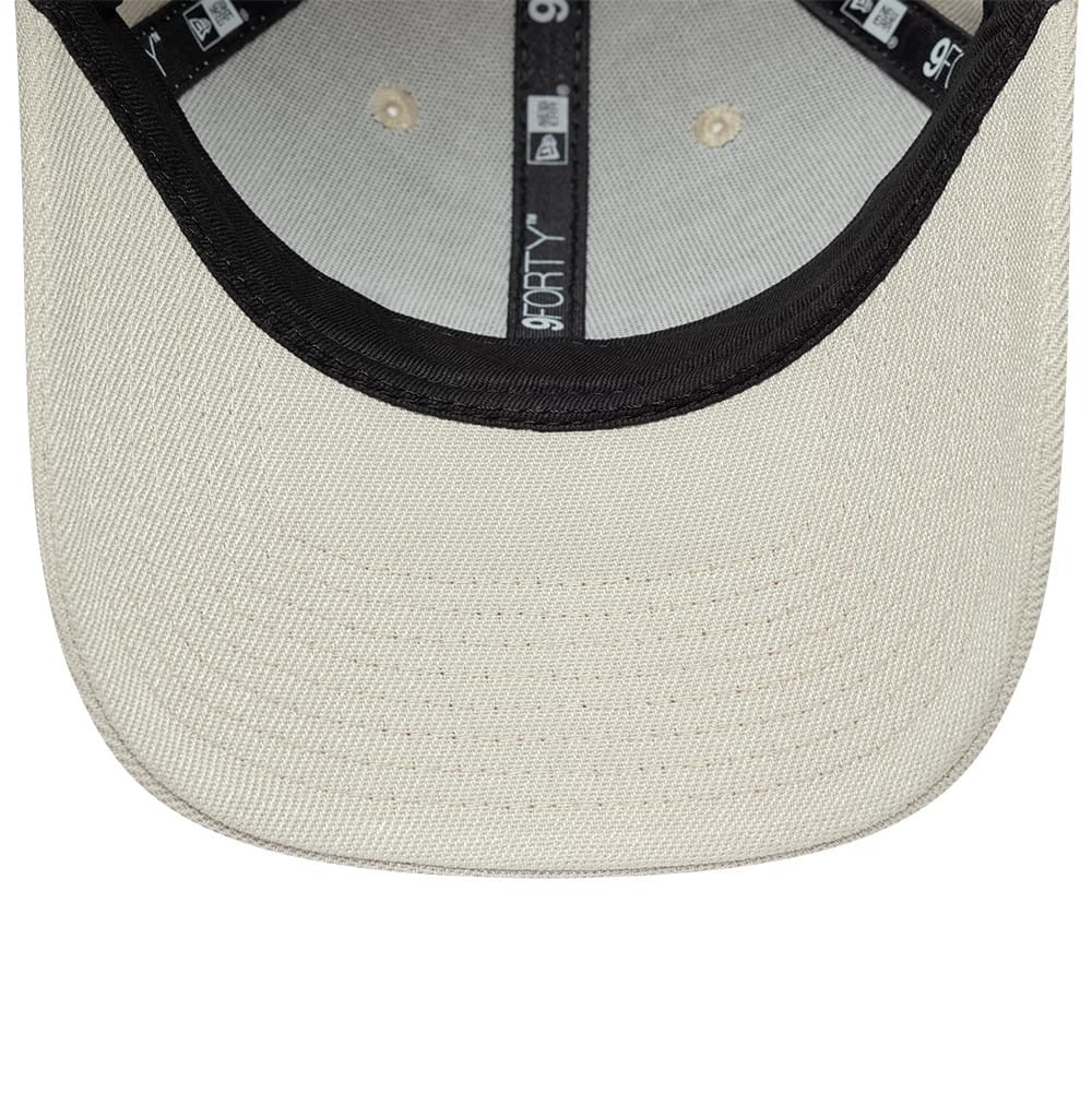 Pictured is this New Era Earth Day 9FORTY Adjustable cap in beige. 7