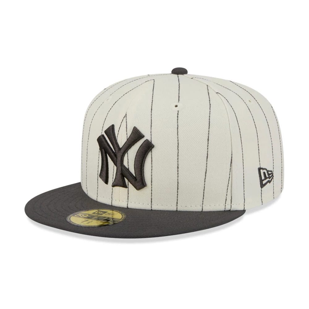 New York Yankees MLB Stripes Cream & Black New Era 59FIFTY Fitted Cap, front view with a raised black embroidered NY logo on the cream pinstriped crown, black visor, and New Era flag logo on the left side.