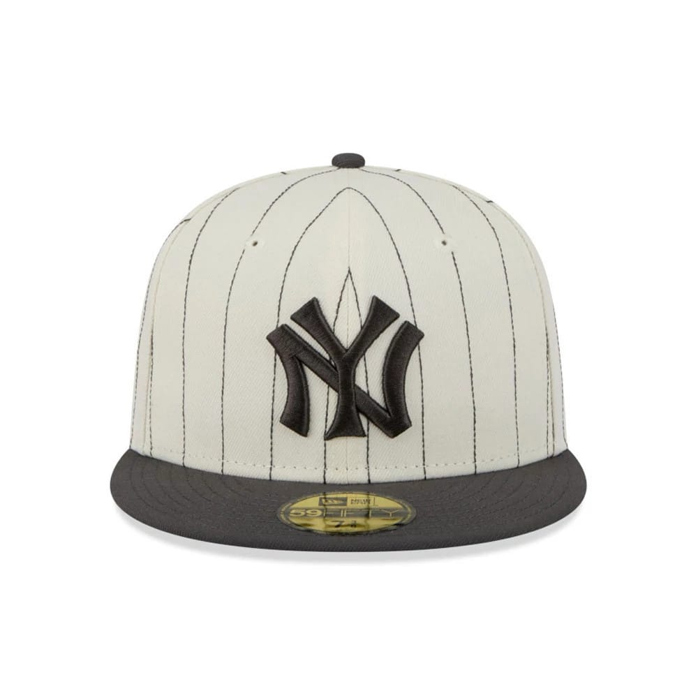 New York Yankees MLB Stripes Cream & Black New Era 59FIFTY Fitted Cap, front view showing raised embroidered NY logo on the crown with black pinstripes, grey visor, and gold 59FIFTY size sticker on top.
