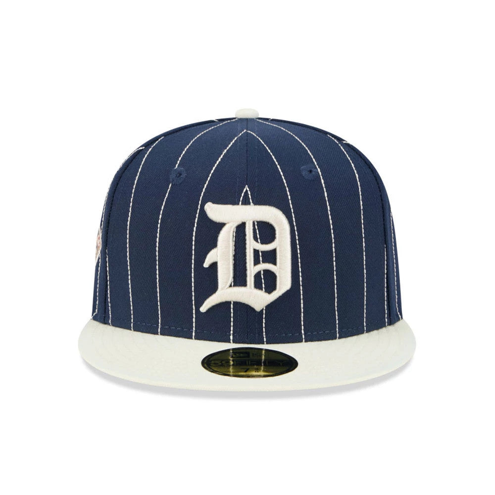 Detroit Tigers MLB Stripes Dark Blue New Era 59FIFTY Fitted Cap, front view showing the white embroidered D logo on the dark blue pinstriped crown, with a contrasting white visor and gold 59FIFTY size sticker on top.