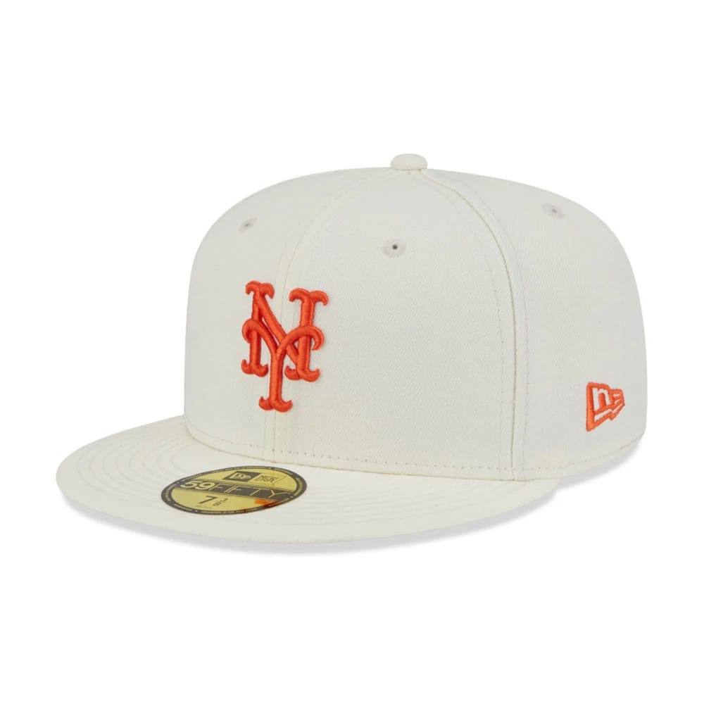 New York Mets MLB City Series White New Era 59FIFTY Fitted Cap, three-quarter view showing the orange embroidered NY logo on the front panel, orange New Era flag logo on the left side, and gold 59FIFTY size sticker on the visor.