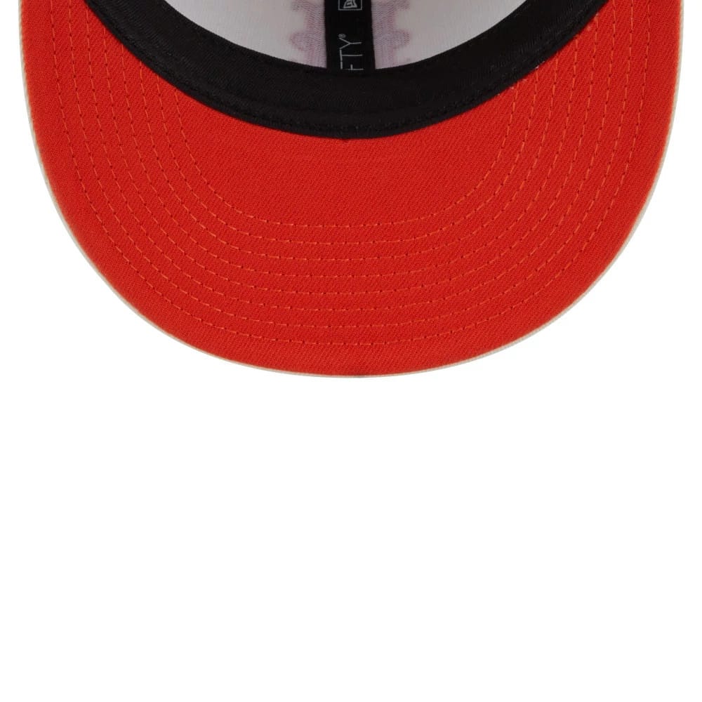 New York Mets MLB City Series White New Era 59FIFTY Fitted Cap, inside view showing the bright orange undervisor with black sweatband, and fabric taping running along the interior seams.