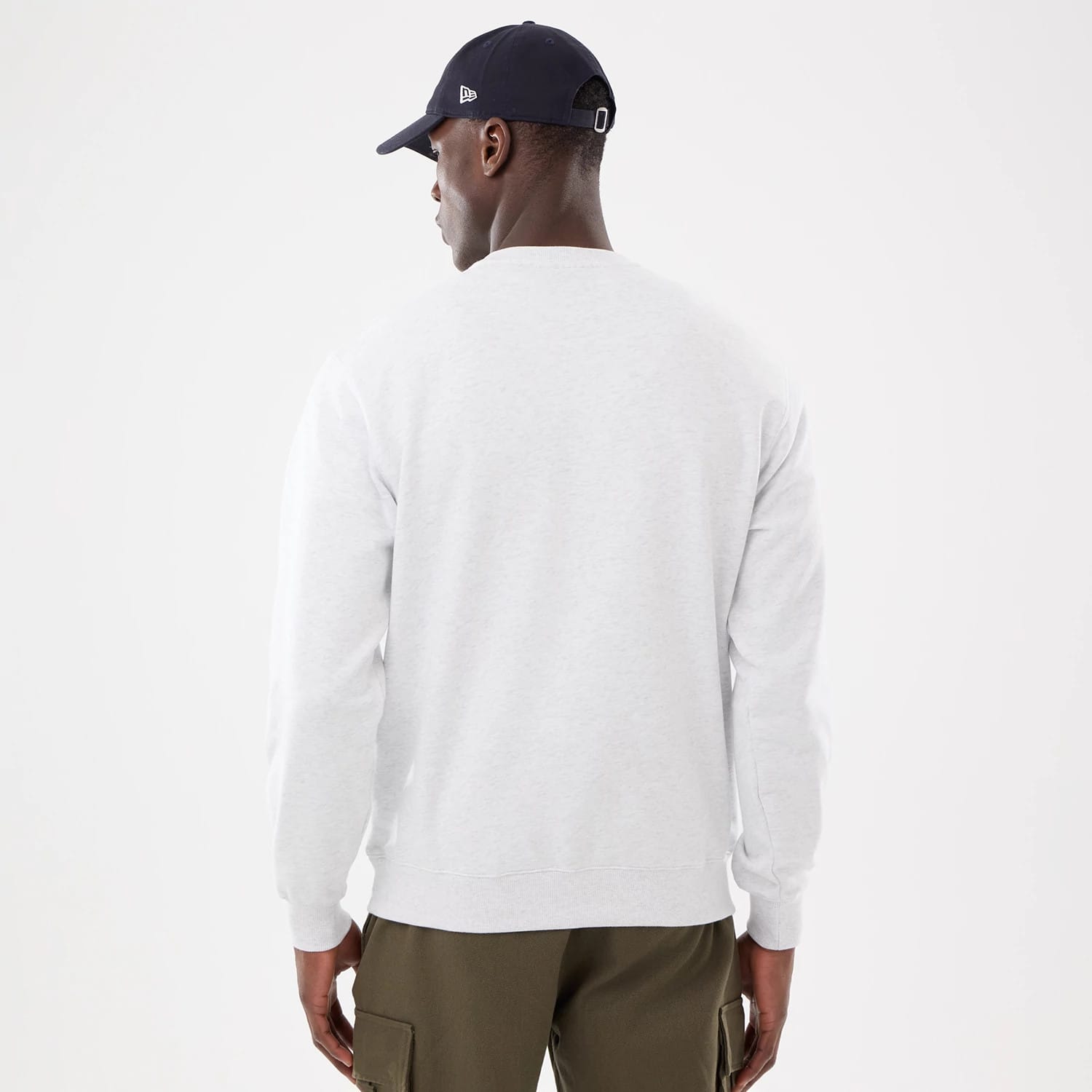 The model is wearing this MLB Retro New York Yankees Oversized Crew Neck Sweater in White 2
