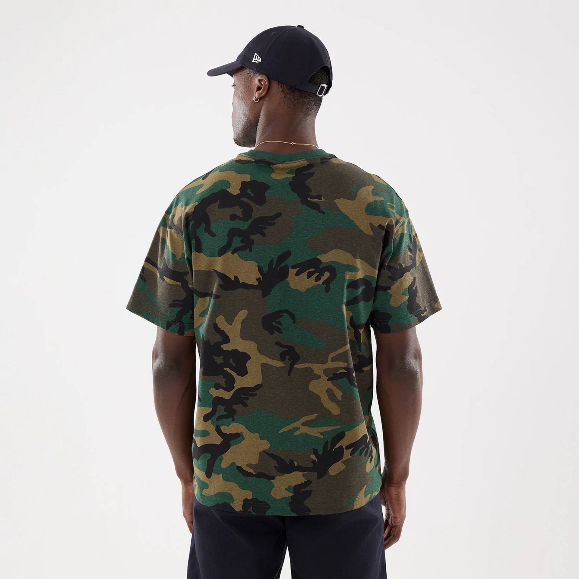 The model is wearing this MLB Camo New York Yankees T-Shirt in Woodland Camo. 2