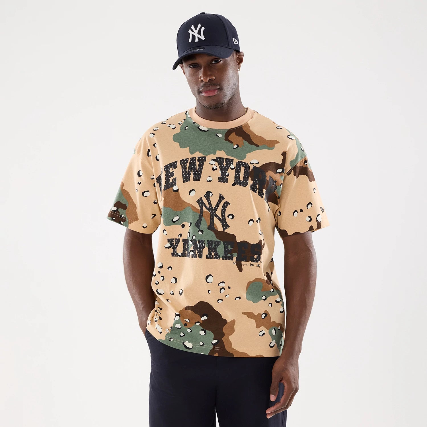 The model is wearing this MLB Camo New York Yankees T-Shirt in Desert Camo . 1