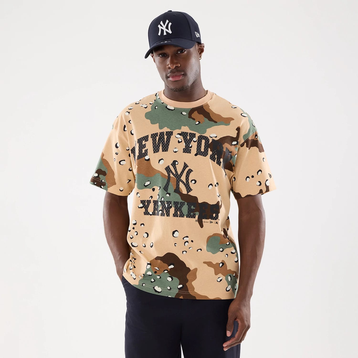 The model is wearing this MLB Camo New York Yankees T-Shirt in Desert Camo . 1