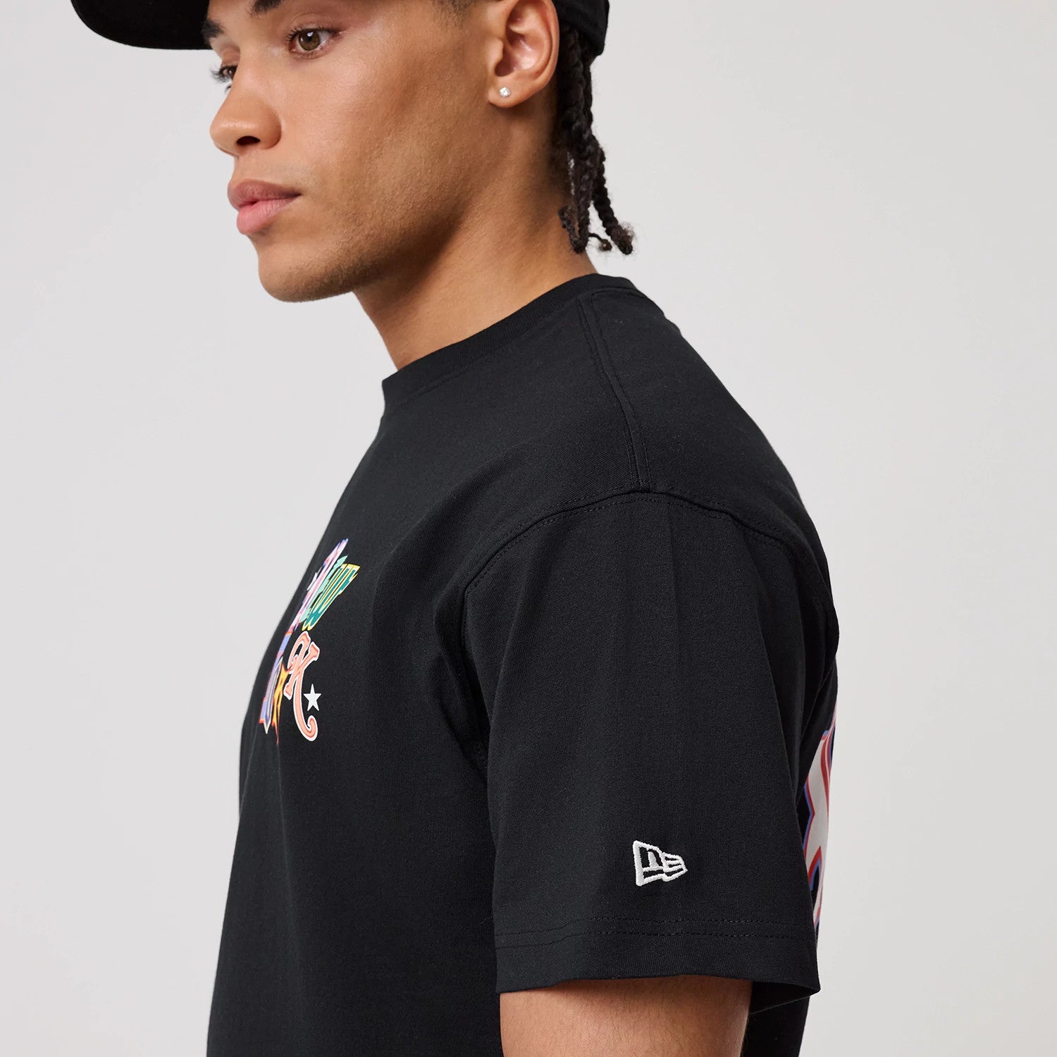 The model is wearing this MLB Word Art New York Yankees T-Shirt in black. 4