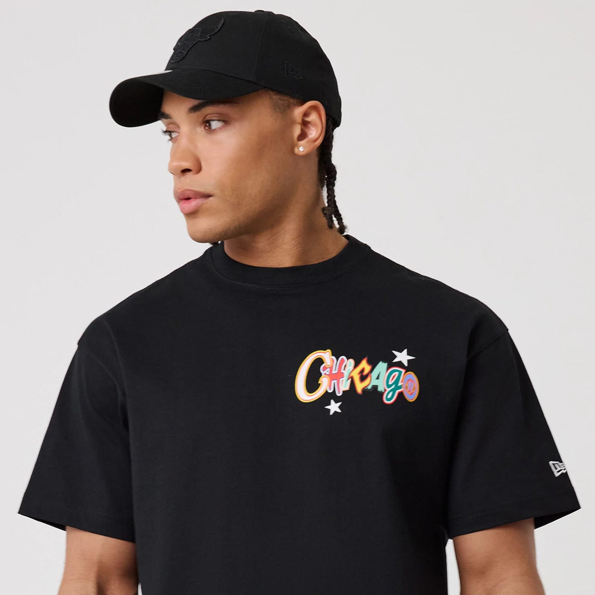 The model is wearing this MLB Word Art Chicago Bulls T-Shirt in black. 7