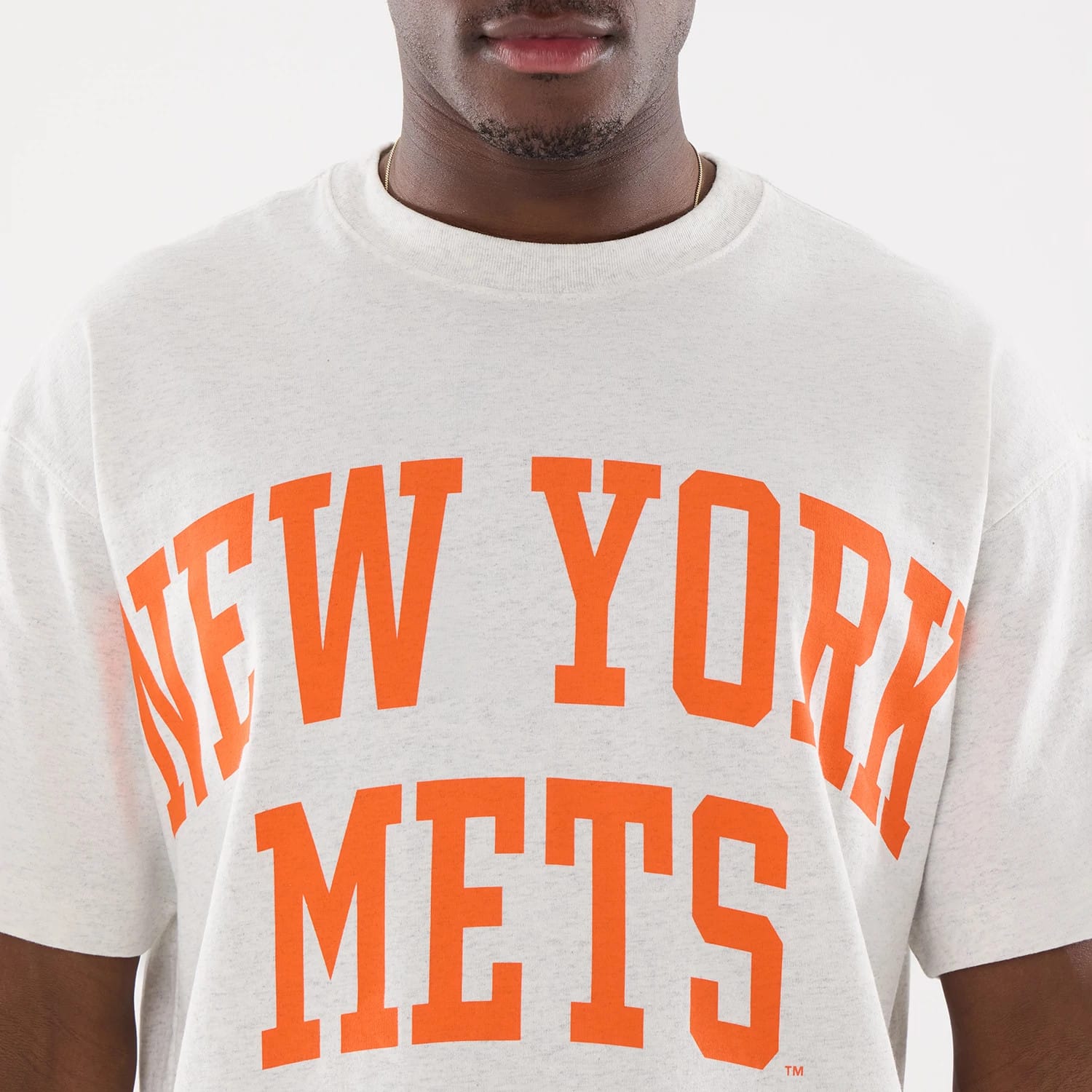 New Era New York Mets MLB Comfort Grey T-Shirt, front view showing the bold orange New York Mets text arching across the chest on a light grey background.
