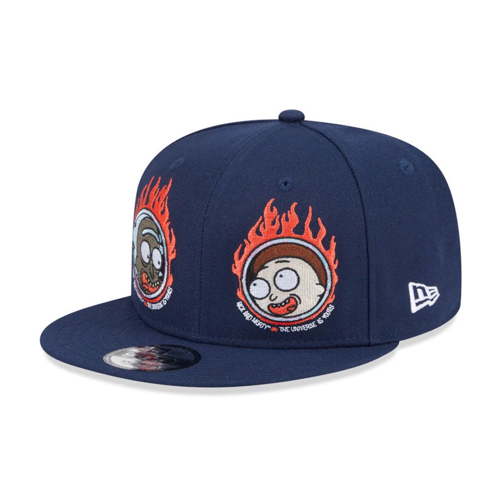 Rick And Morty Dark Blue New Era 9FIFTY Adjustable Cap, three-quarter view with raised embroidered flaming Morty face on the navy front panel, grey eyelets, flat visor and a 9FIFTY size sticker, New Era flag logo on the left side.
