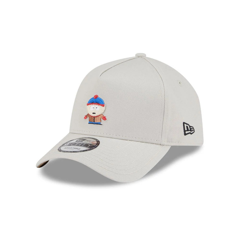 South Park Stan Marsh Beige New Era 9FORTY A-Frame Adjustable Cap, front view with the embroidered character centred on the front panel, a black New Era flag logo on the left side, and a 9FORTY size sticker on the curved visor.