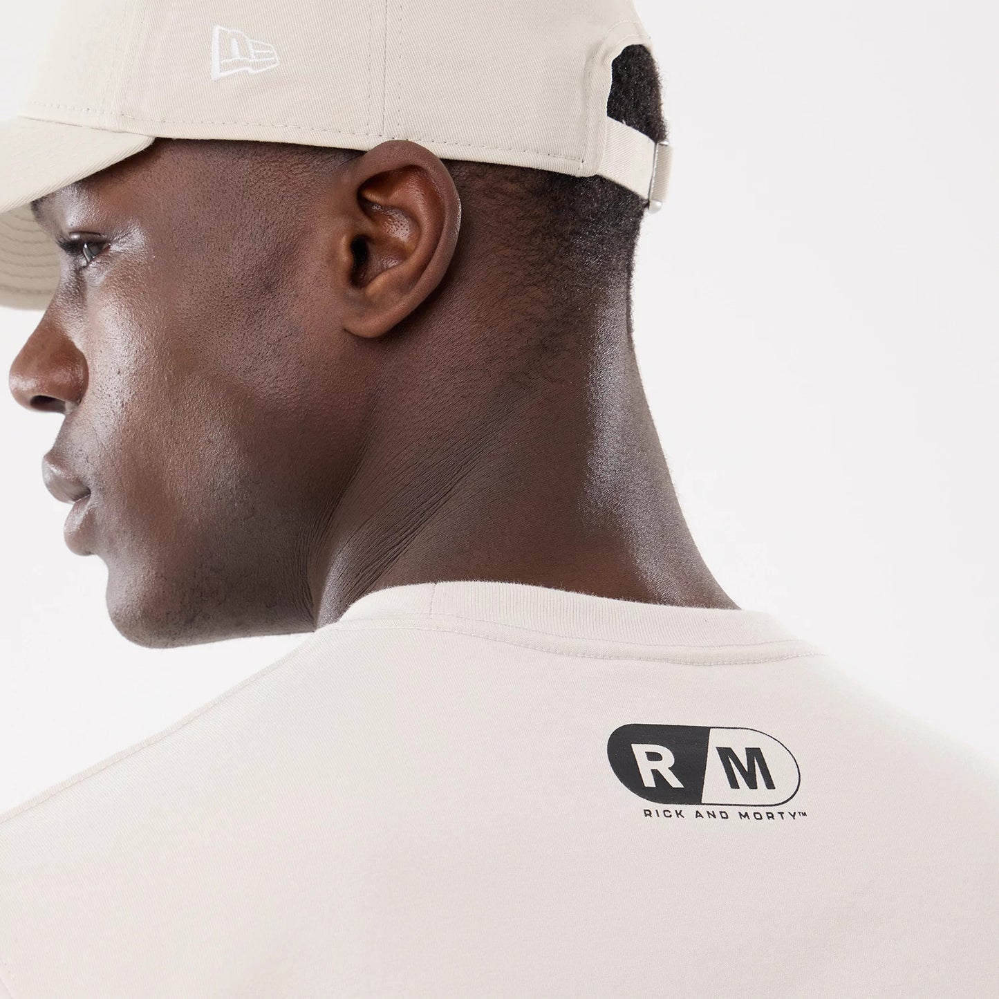 The model is wearing this Rick And Morty Character Stack T-Shirt in cream. 7