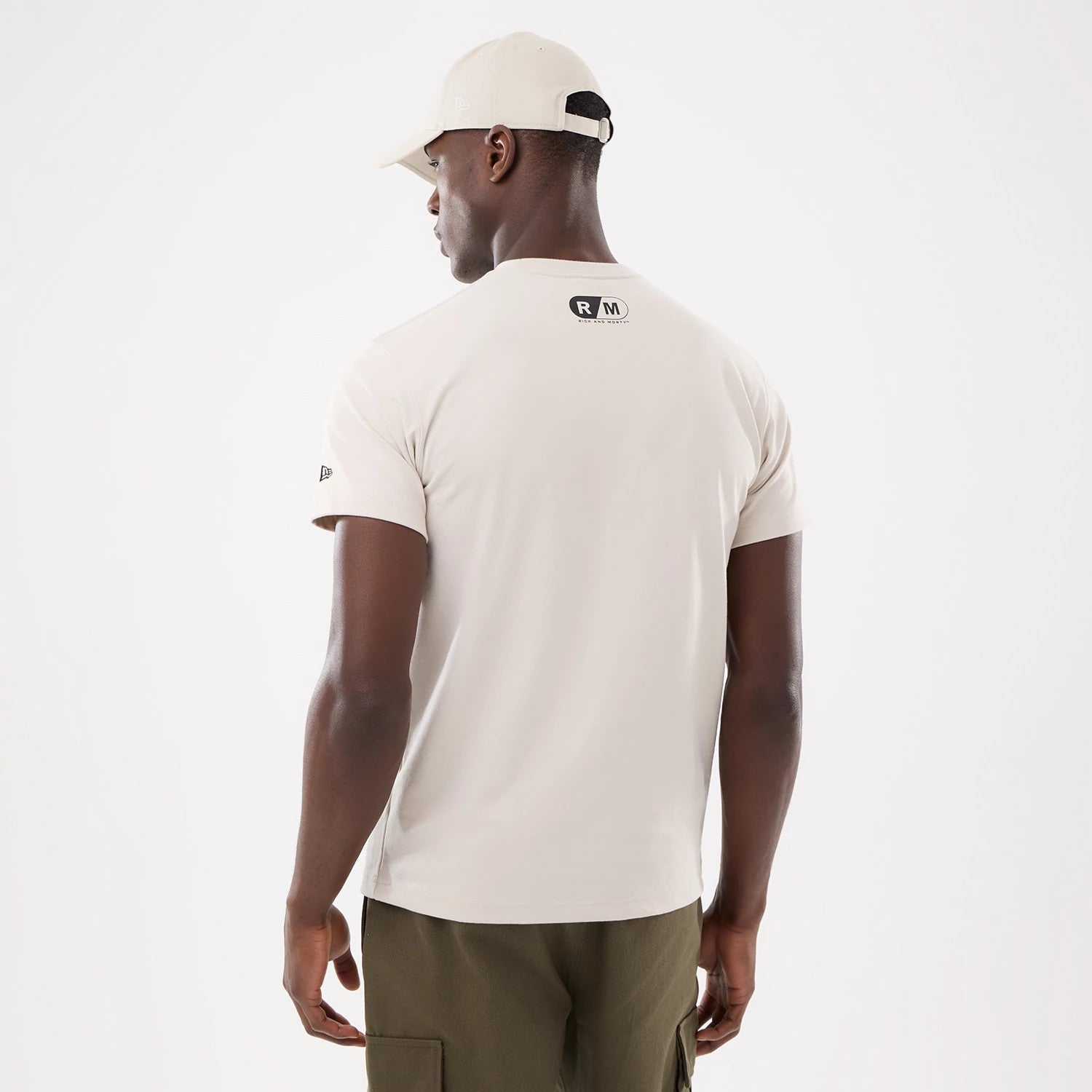 The model is wearing this Rick And Morty Character Stack T-Shirt in cream. 2