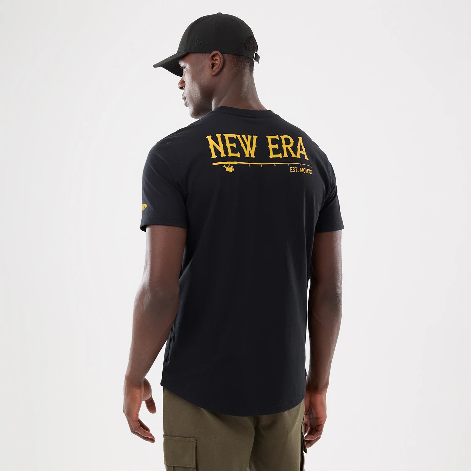 The model is wearing this New Era Outdoor Fishing T-Shirt in black. 2