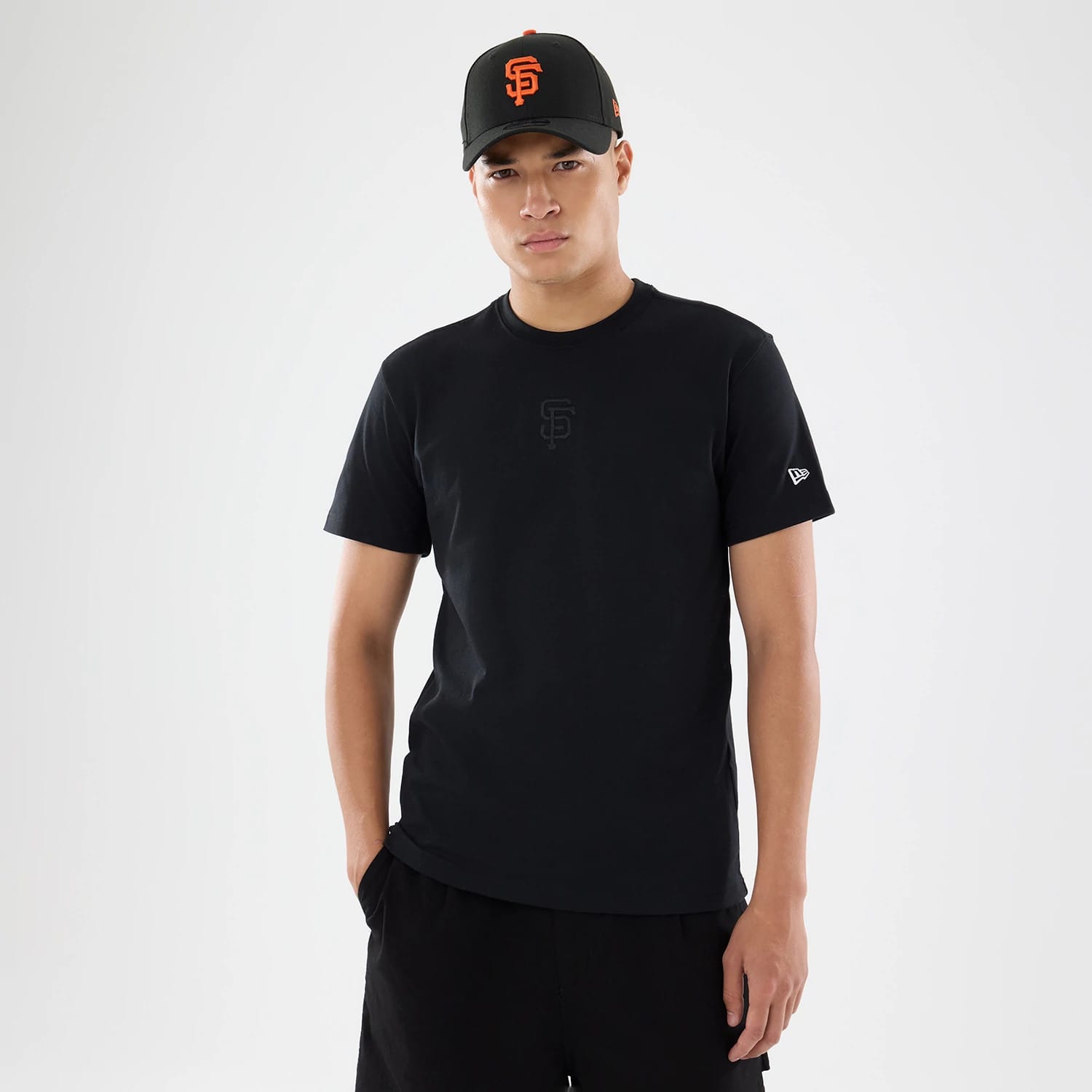 The model is wearing this MLB Cartoon San Francisco Giants T-Shirt in black. 1
