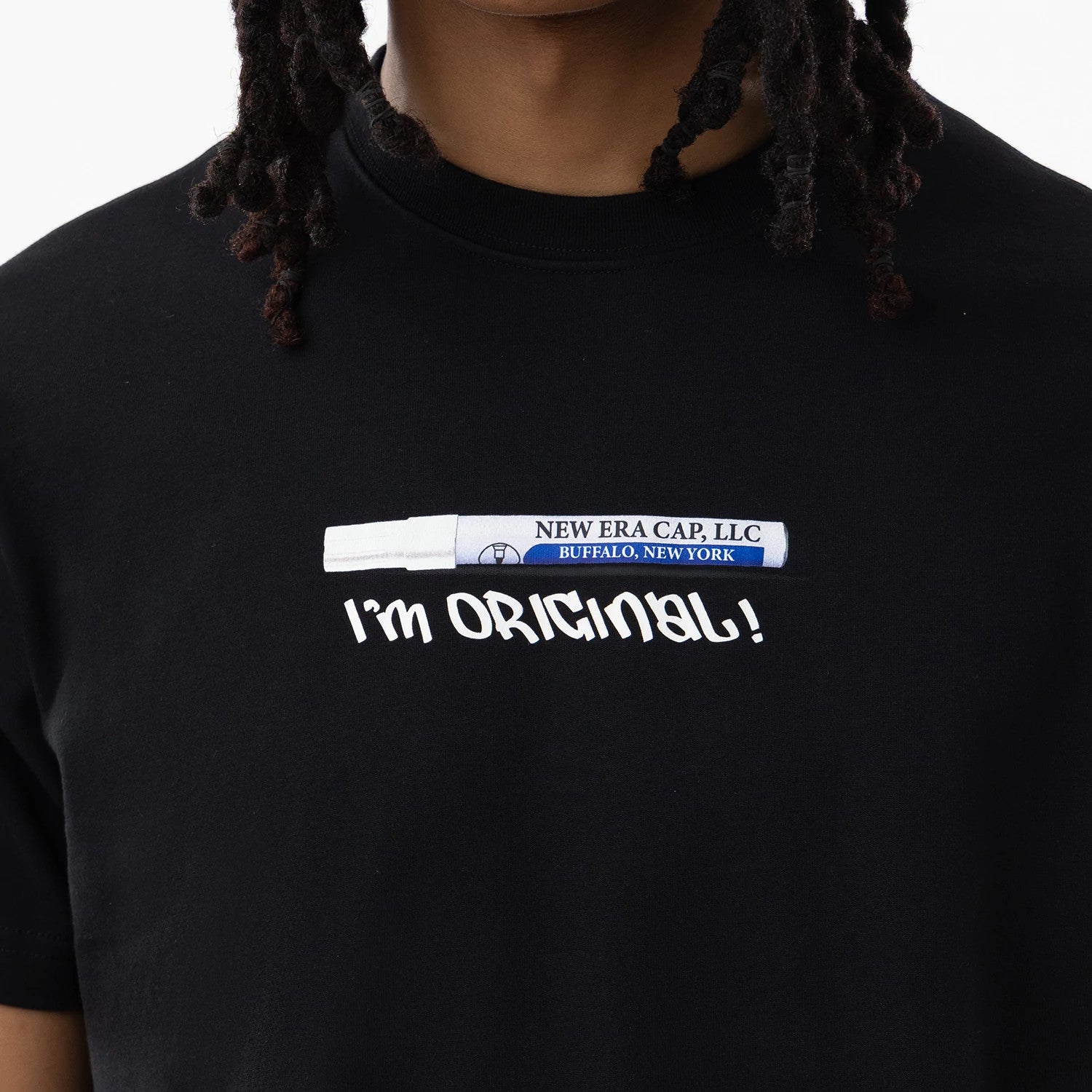 The model is wearing this New Era I Am Original T-Shirt in black. 3