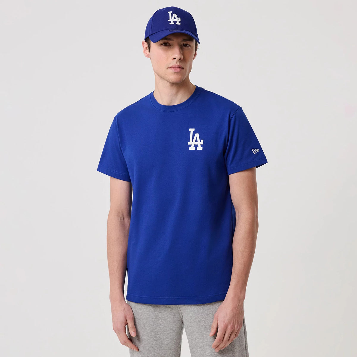 The model is wearing this MLB Banana Graphic LA Dodgers T-Shirt in bright blue. 1