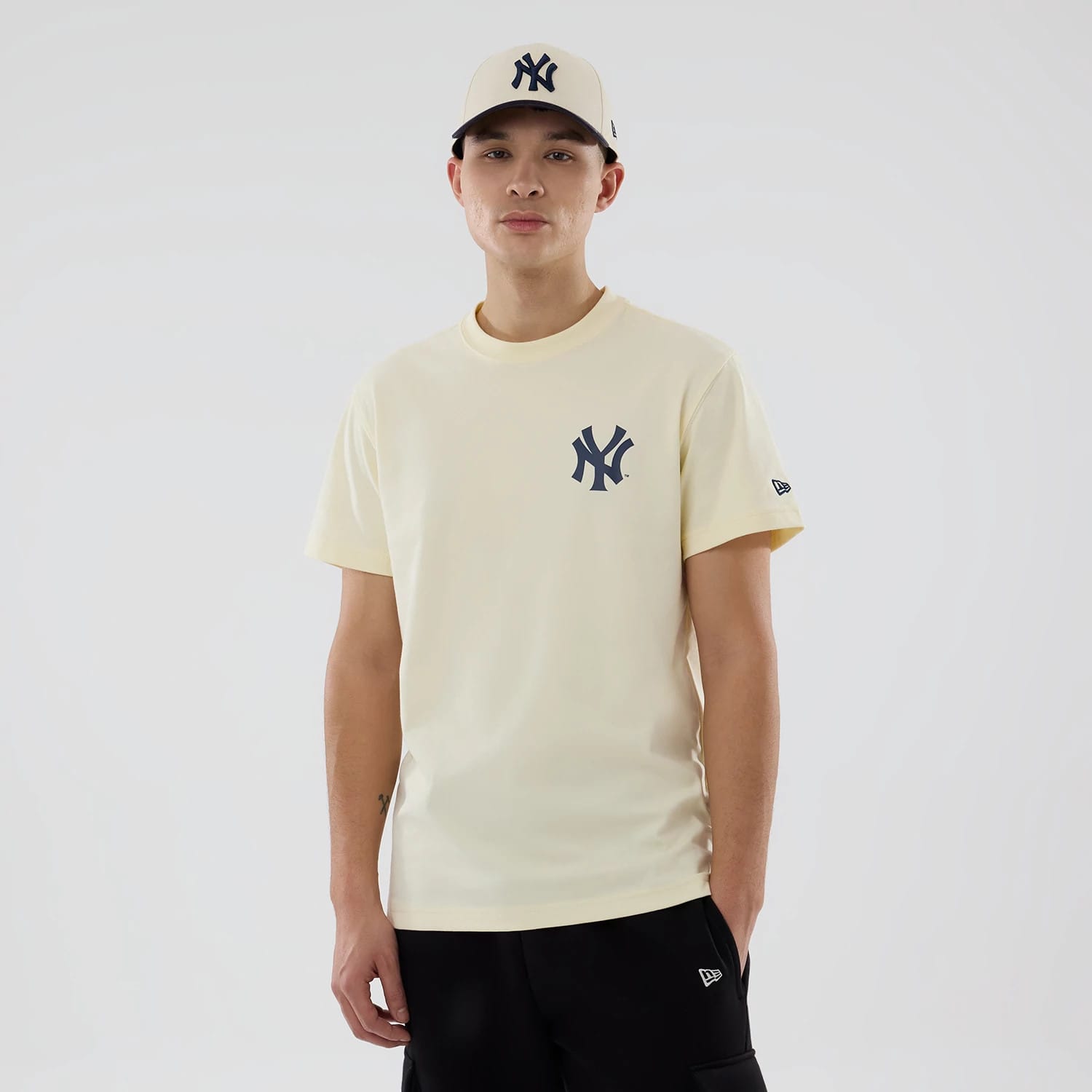 The model is wearing this MLB City Series New York Yankees T-Shirt in cream. 1