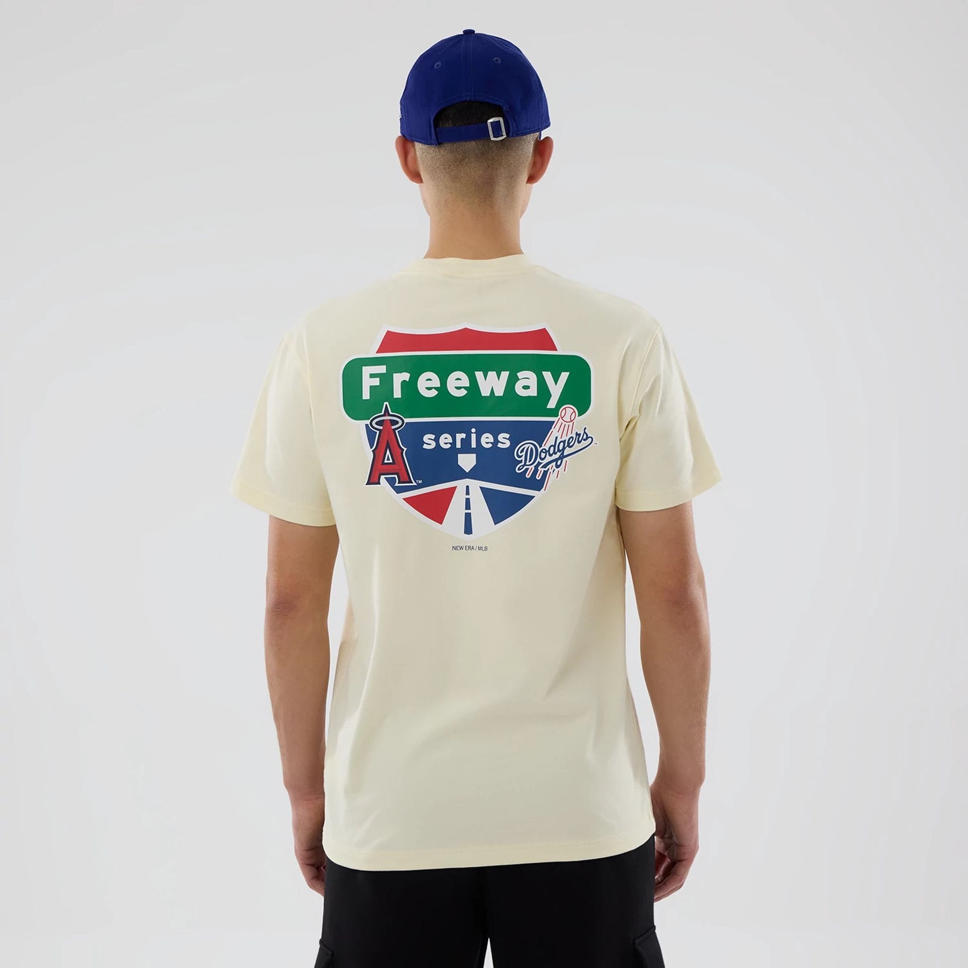 The model is wearing this MLB City Series LA Dodgers T-Shirt in white. 2