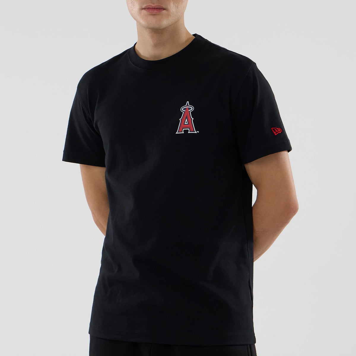 LA Angels MLB City Series Black T-Shirt, front view showing a black t-shirt with a raised LA Angels logo in red and white on the left chest and a raised New Era logo in red on the left sleeve.