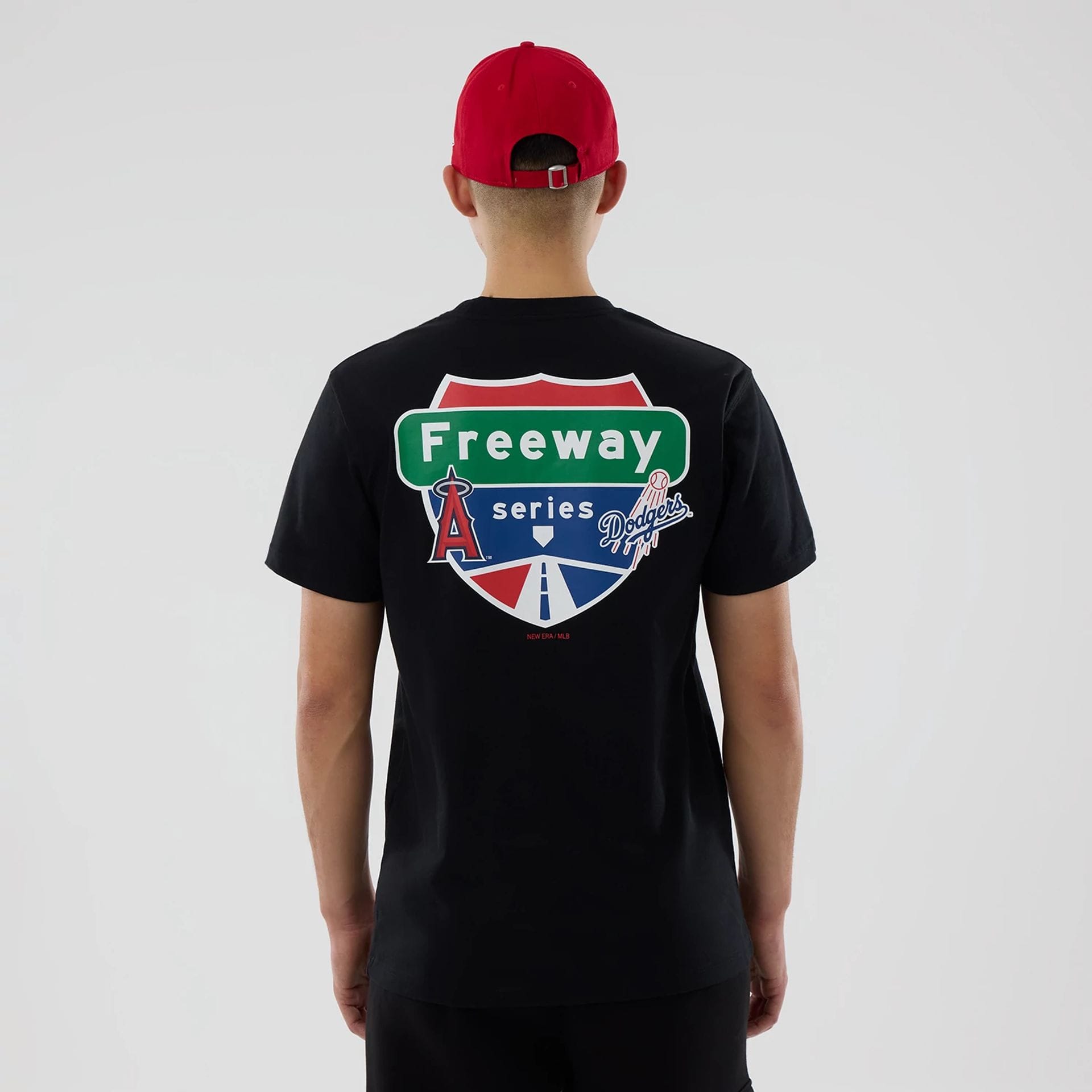 The model is wearing this MLB City Series LA Angels T-Shirt in black. 2