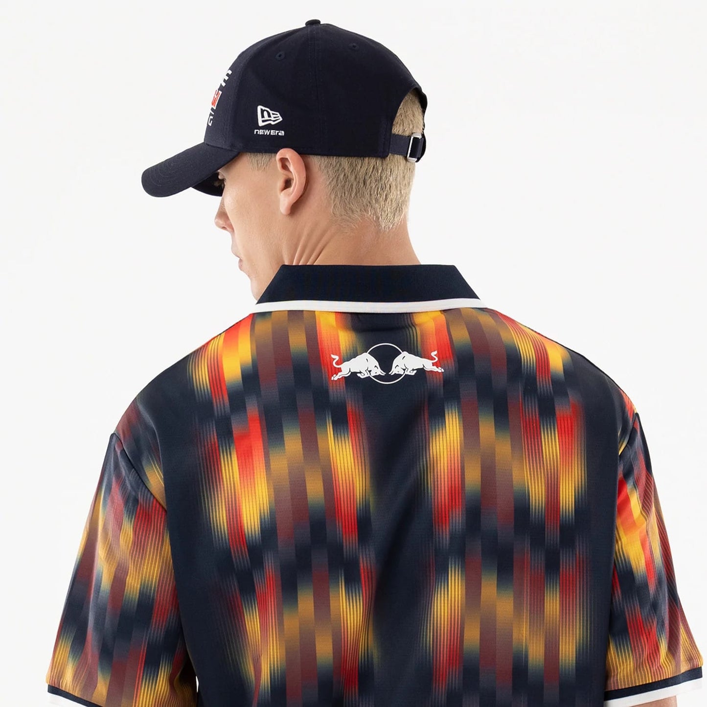 The model is wearing this Red Bull Racing Soccer Jersey in multi. 7