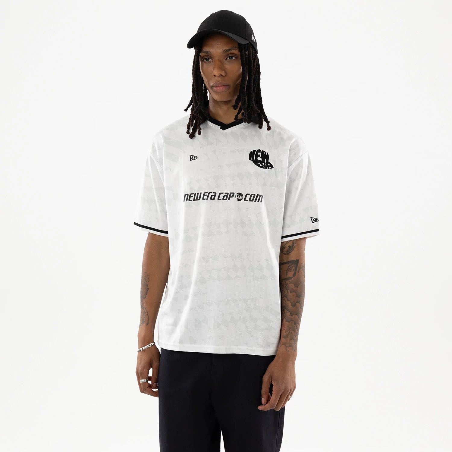 The model is wearing this New Era Soccer Jersey in white. 1