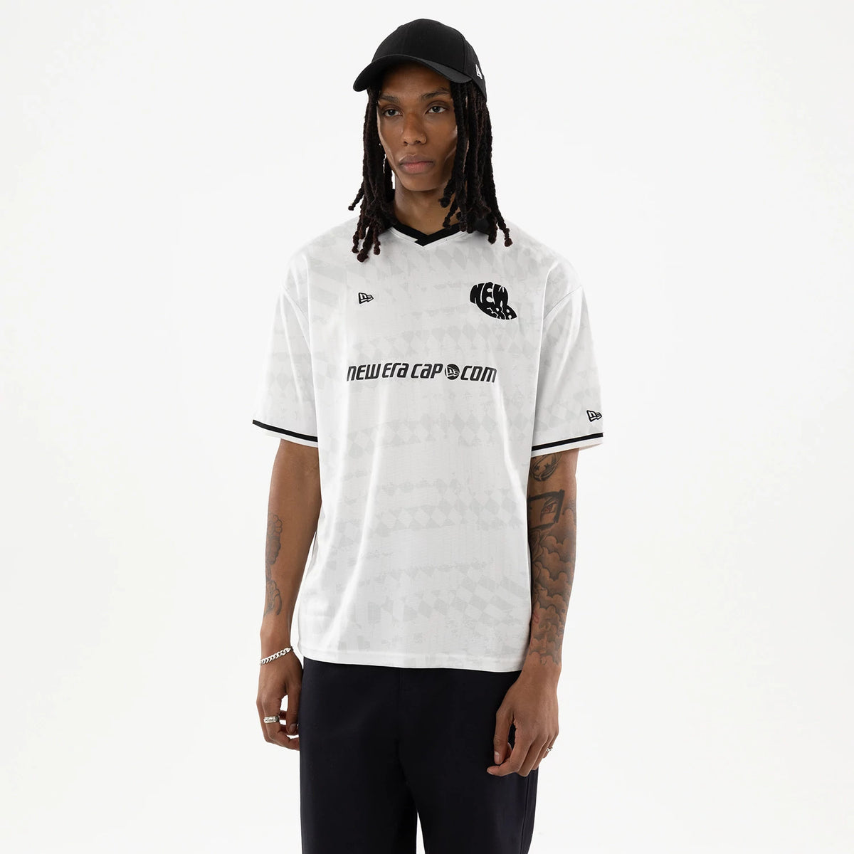 The model is wearing this New Era Soccer Jersey in white. 1