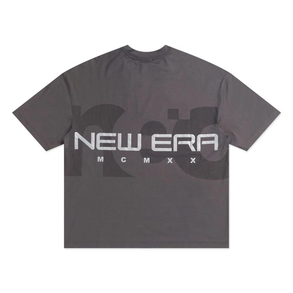 The model is wearing this New Era NEC Logo Oversized T-Shirt in black. 6