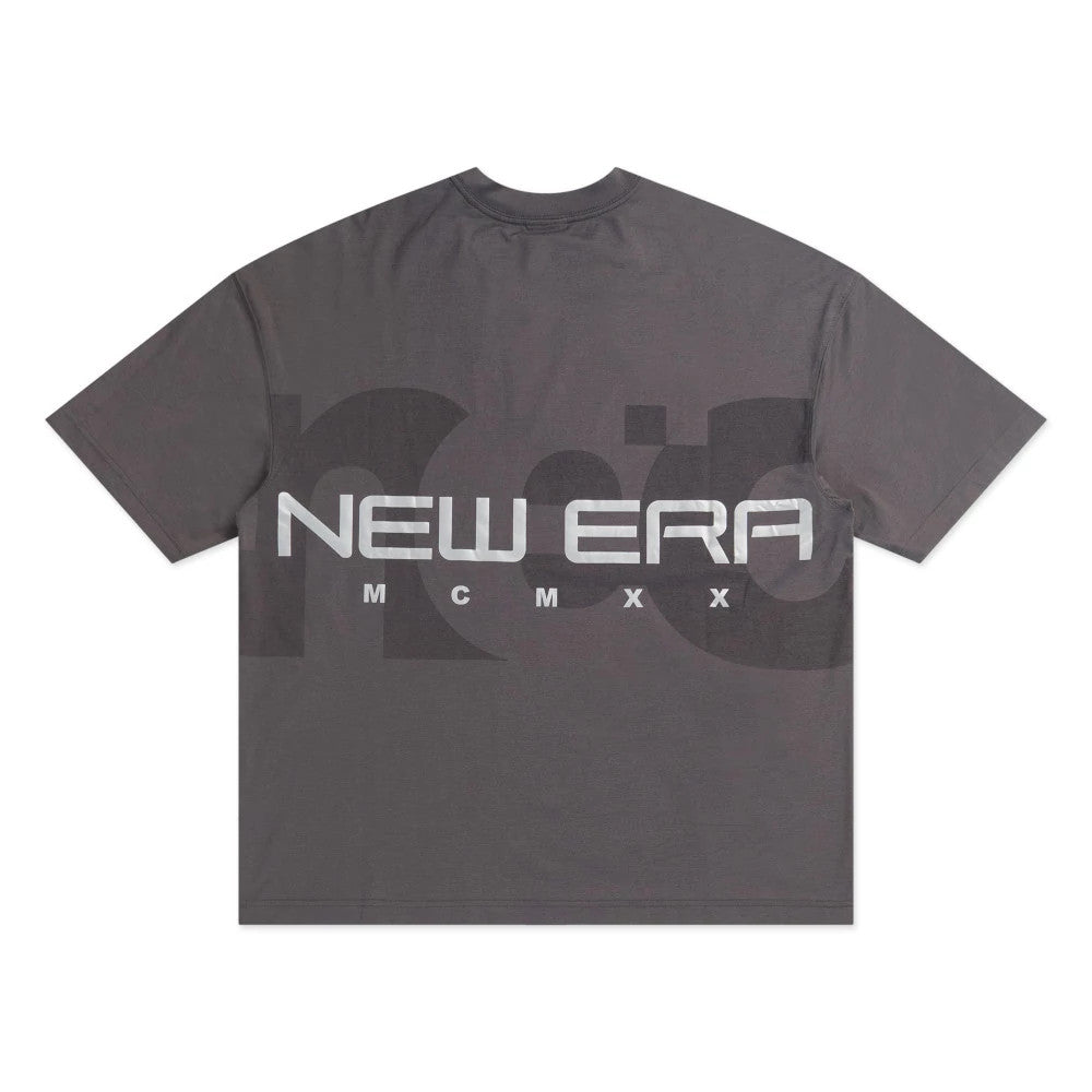 New Era NEC Logo Black Oversized T-Shirt, rear view showing a large grey t-shirt with the text "NEW ERA" and "MCMXX" in white across the back, set against a darker oversized NEC logo that spans the width of the shirt.