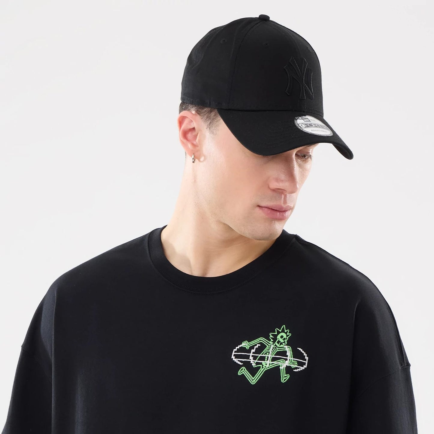 The model is wearing this Rick And Morty X-Ray T-Shirt in black. 7