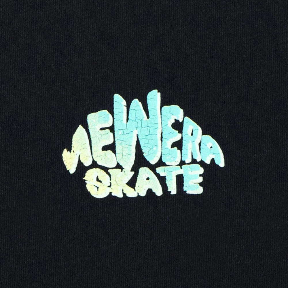 The model is wearing this New Era Skate Is Life Graphic Oversized T-Shirt in black. 3
